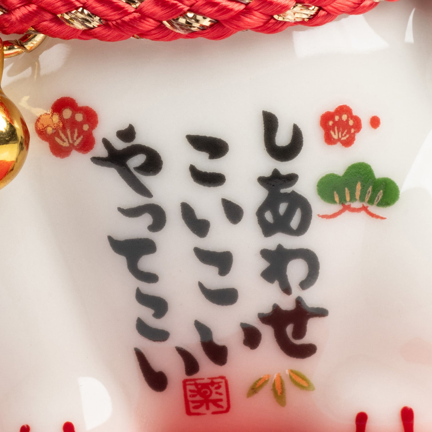 Ginger Tom Japanese Lucky Cat and Red Cushion detail