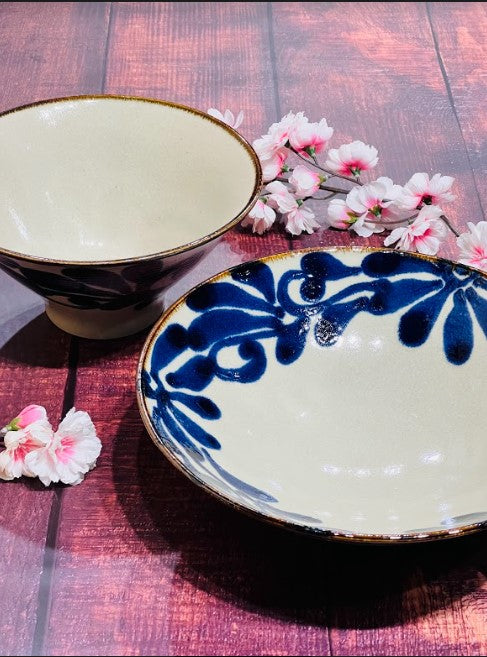 Two white and blue Japanese style bowls.